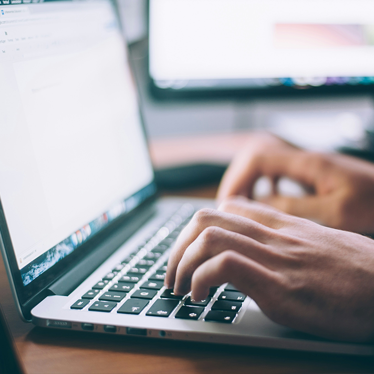 Student sitting staring at the camera