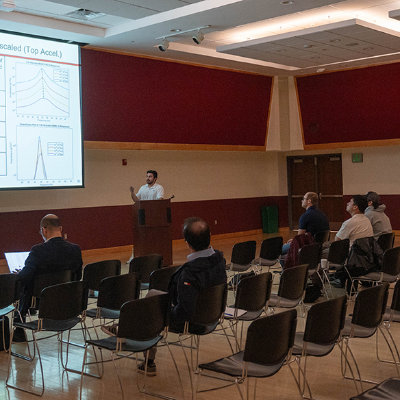 A man gives a speech to an audience