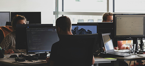 Man working on a desktop computer.
