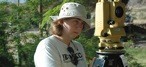 person using beakers