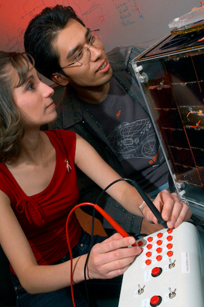 students testing electrical components