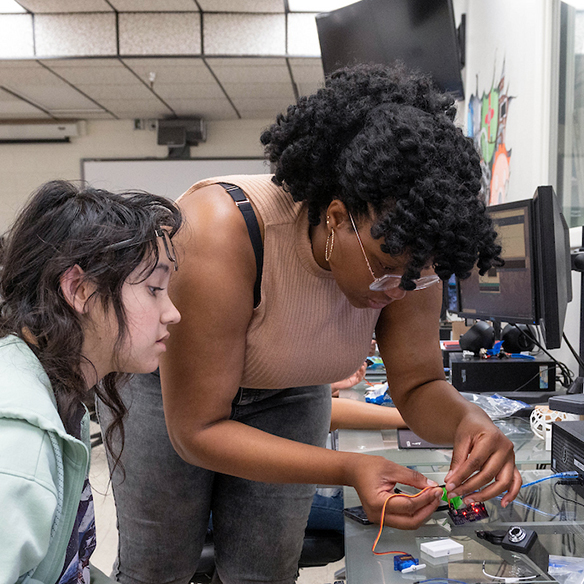 students at work station