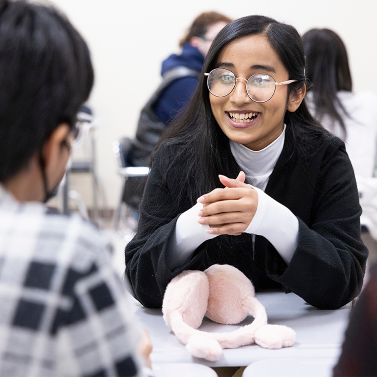 Student walking across campus
