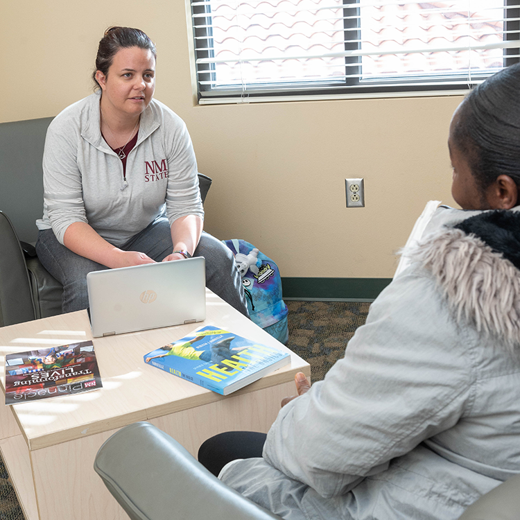 Student looking at their cell phone