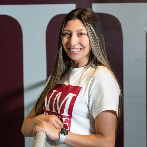 Student standing on stairwell