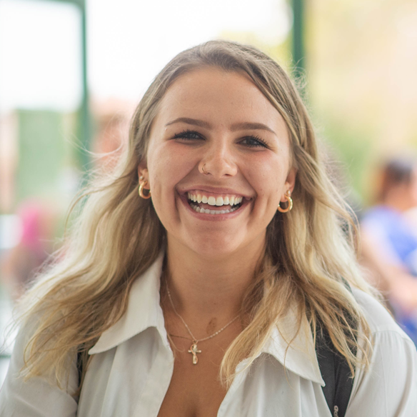NMSU Student Smiling