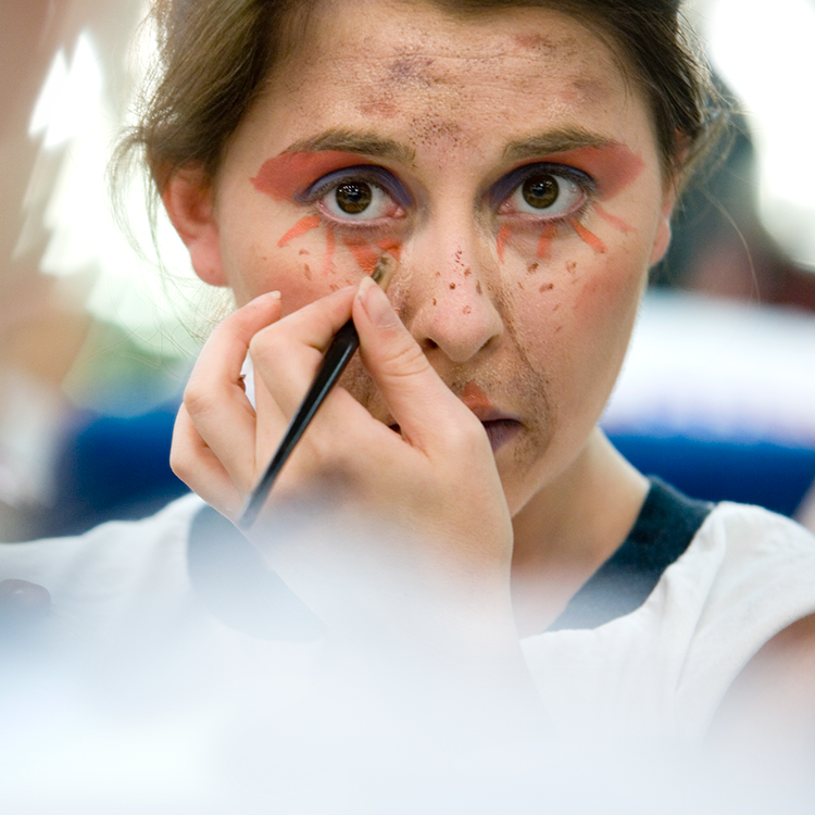 Students working in the theatre scene shop