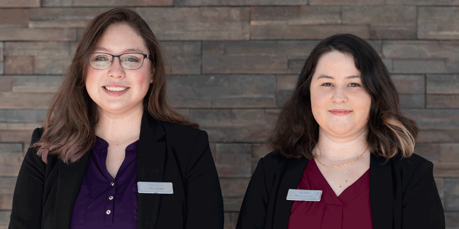 Two student employees of a hotel.