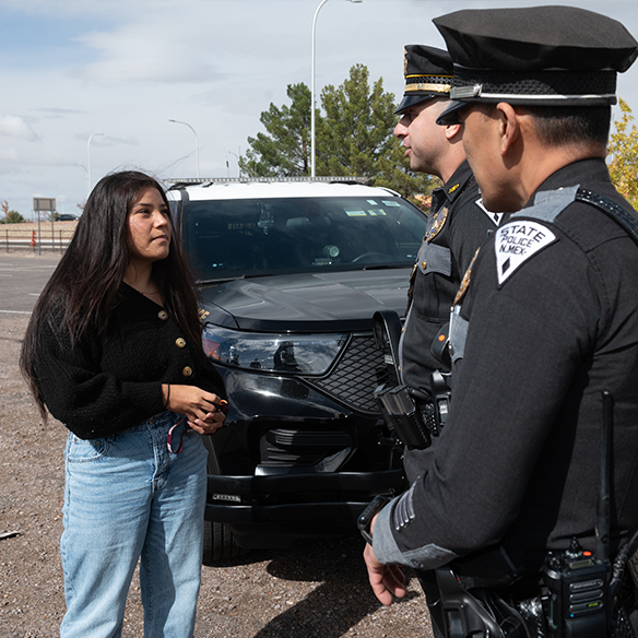 A criminal justice student speaking to campus police. 