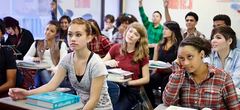 Students in classroom engaged in lecture