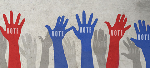 Raised hands with the word 'vote' on them.